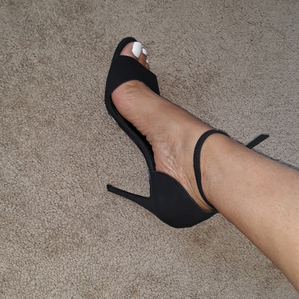 Steve Madden black strappy heels.